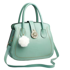 Xshe Women's Oval Handbag Stylish Shoulder Bag with Decorative Pendant & Zipper Closure