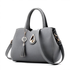 Xshe Women's Elegant Handbag Stylish Crossbody Shoulder Bag with Tassel Charm